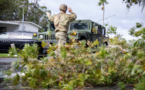 Florida Army National Guard Soldiers with the 3rd Battalion, 116th Field Artillery Regiment, conduct a Survey and Assist patrol following Hurricane Milton in Kissimmee, Florida, Oct. 10, 2024. The Florida National Guard ensures the safety and well-being of residents in affected areas. (U.S. Army photo by Sgt. Marc Morgenstern)