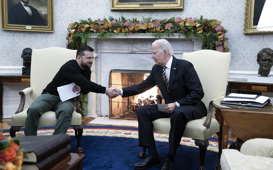 President Joe Biden meets with Ukrainian President Volodymyr Zelenskyy in the Oval Office at the White House in Washington on Tuesday, Dec. 12, 2023. 