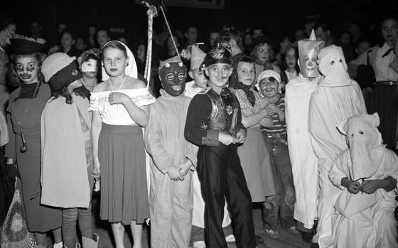 Heidelberg, Germany, Oct. 30, 1948: Devils, ghosts, pirates, ladies and what appears to be a time travelling Austrian Hungarian police officer from the early1900s pose for a photo. The Halloween party was one of many held for children of U.S. military stationed in the American zone of Allied-occupied Germany. 

See additional images from Heidelberg's Halloween celebration here. 

Happy Halloween from Stars and Stripes! May your candy be plentiful and your teeth never rot! 

META TAGS: Europe; Germany; Halloween; American holiday; military family; dependents; kids; children; party; Archives Month