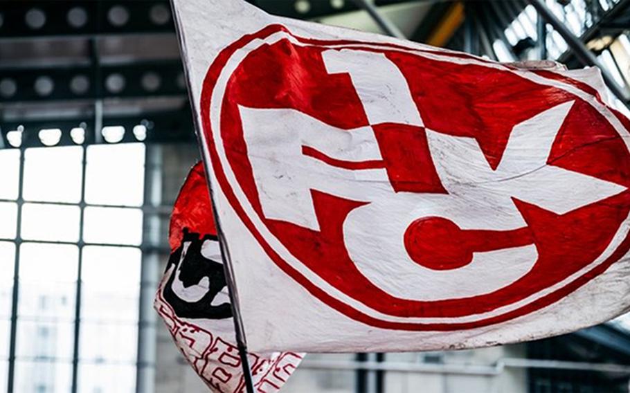 1. FC Kaiserslautern fans wave flags during a second division game. The Red Devils play in Elversberg on Saturday.