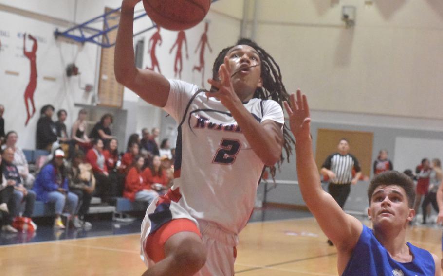 Aviano’s Andrew Walker goes to the basket to score two of his game-high 18 points in the Saints’ 57-29 victory over Marymount on Friday, Dec. 1, 2023.