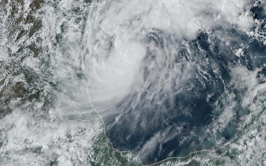 This GOES-16 GeoColor satellite image taken at 4:50 p.m. EDT on Oct. 5, 2024, shows Tropical Storm Milton, center, off the coast of Mexico in the Gulf of Mexico. 