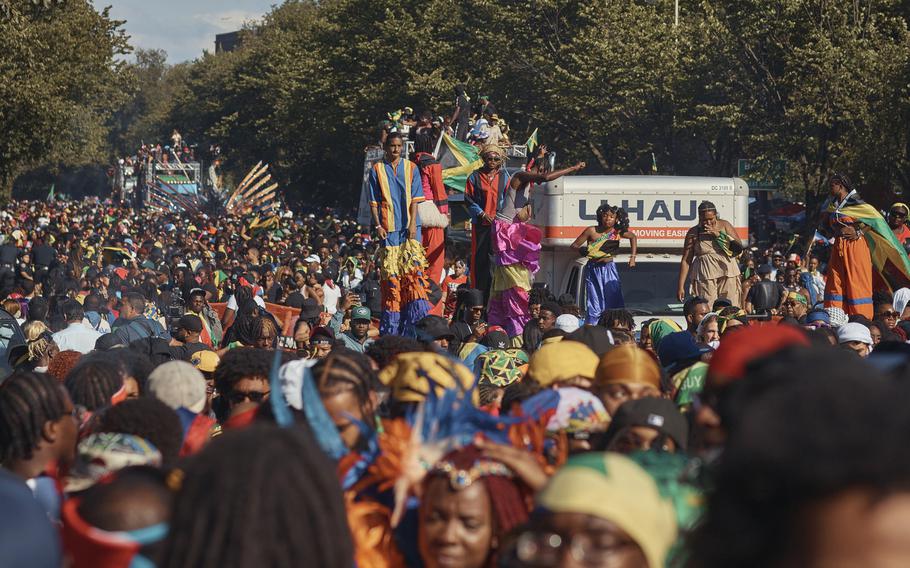 Revelers march at the intersection of Franklin Avenue and Eastern Parkway during the West Indian Day Parade