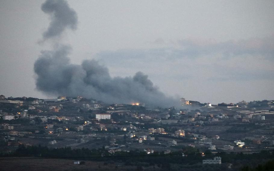 Smoke billows from the site of an Israeli strike