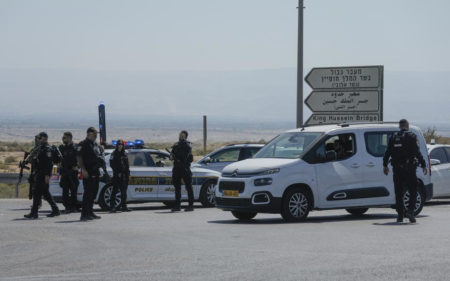 Israeli police stand guard at the site of a shooting in the West Bank