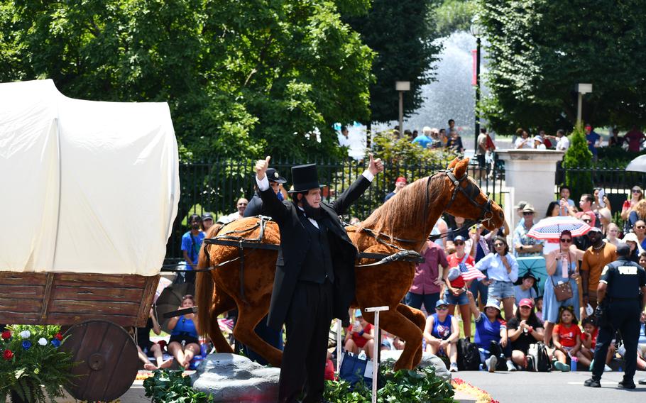 Former U.S. President Abraham Lincoln gives thumbs up to the crowd at the nation’s captial’s Independence Day parade in Washington, D.C.