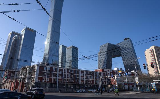 The CITIC Tower, fourth left, and the CCTV headquarters building, second right, among other buildings in Beijing, China, on Monday, Dec. 30, 2024. MUST CREDIT: Na Bian/Bloomberg