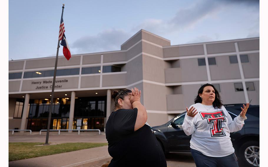 Victoria Halstead, left, wipes away tears after talking about her 17 year-old son being held at the Dallas County Juvenile Department inside the Henry Wade Juvenile Justice Center Dallas, April 18, 2023. She and Ashley Lively, right, a mother of a 15 year-old boy detained inside, were speaking about what they say are poor conditions and inadequate care at the facility.