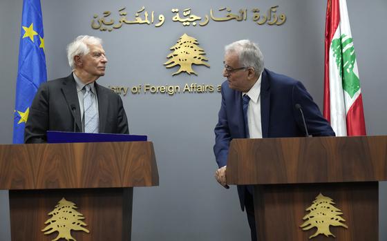 Lebanese Foreign Minister Abdallah Bouhabib, right, looks at the European Union foreign policy chief Josep Borrell, as they attend a joint press conference, in Beirut, Lebanon, Thursday, Sept. 12, 2024. (AP Photo/Hussein Malla)