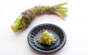 A small plate of grated wasabi.