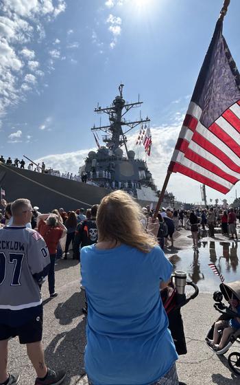 Family and friends of sailors assigned to USS Carney (DDG 64) prepare to reunite with their loved ones during the ship’s homecoming at on Sunday, May 19, 2024, Naval Station Mayport, Fla.
