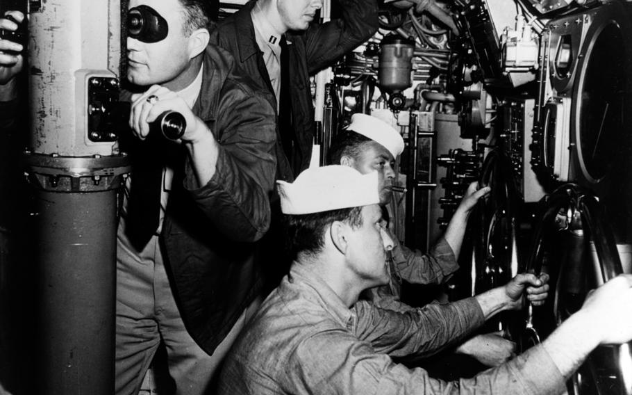 James “Jimmy” Earl Carter Jr. in control room of submarine in 1952