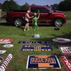 Antique signs are displayed for sale during the U.S. 127 Yard Sale on Aug. 1 in Collinsville, Ala. 