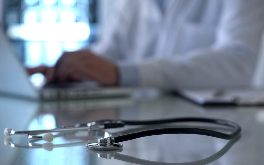 Doctor working at desk