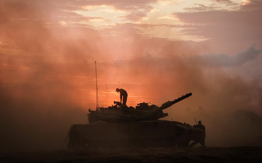 Israeli tank units regroup near the border of Gaza in southern Israel on Oct. 14, 2023. (Marcus Yam/Los Angeles Times/TNS)