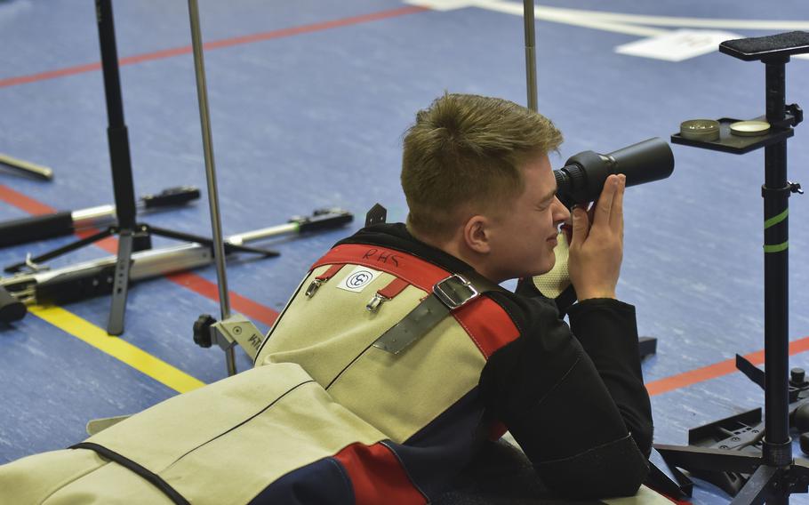 Taben Pfeifer adjusts his scope.