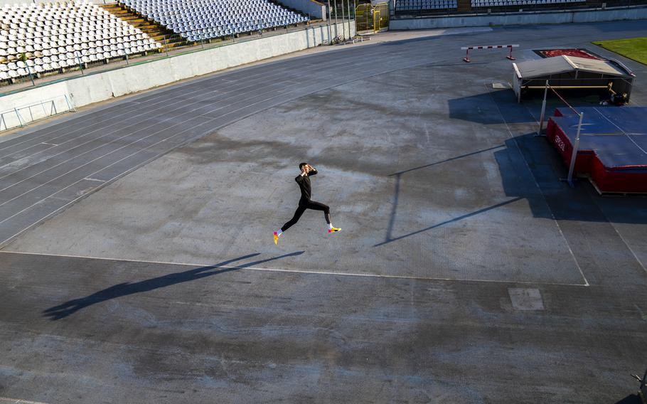 High jumper Oleh Doroshchuk works out during a training session at Zirka stadium, in Kropyvnytskyi, Ukraine, Friday, April 19, 2024.