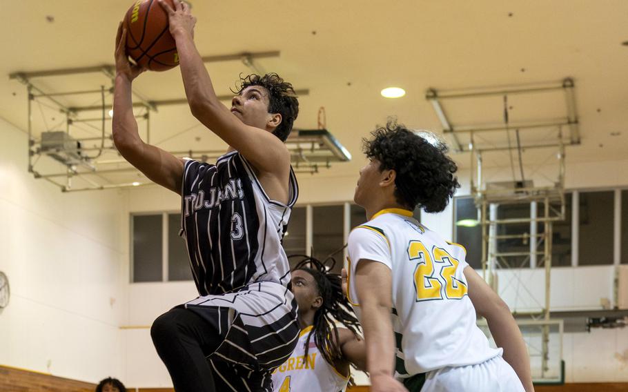 Asher Jorgensen drives to the basket.