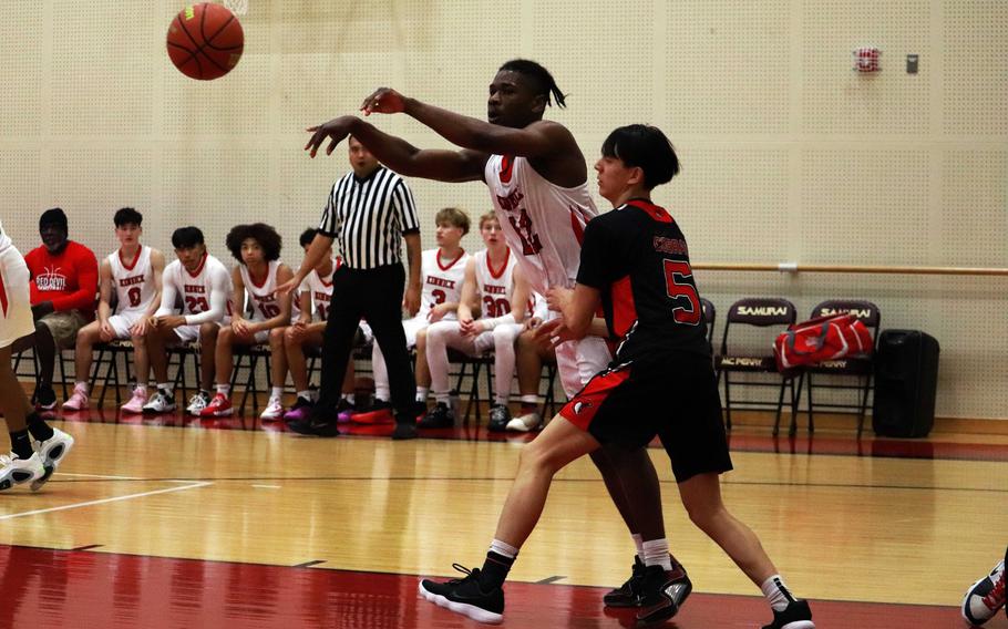 Nile C. Kinnick's Nicholas Whyte passes the ball against E.J. King's Nolan Grubb.