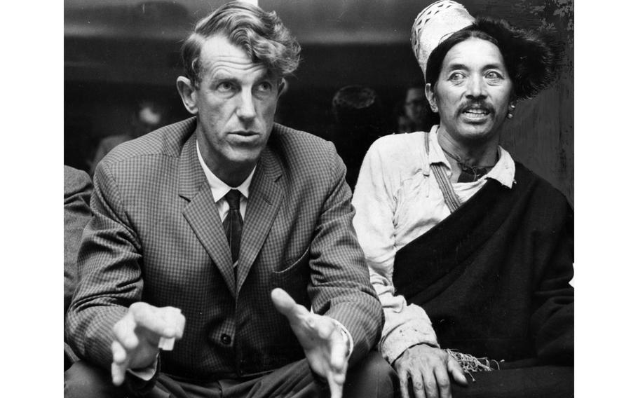 Sir Edmund Hillary, left, and Sherpa village leader Khunjo Chumbi at a 1960 press conference in Tokyo.