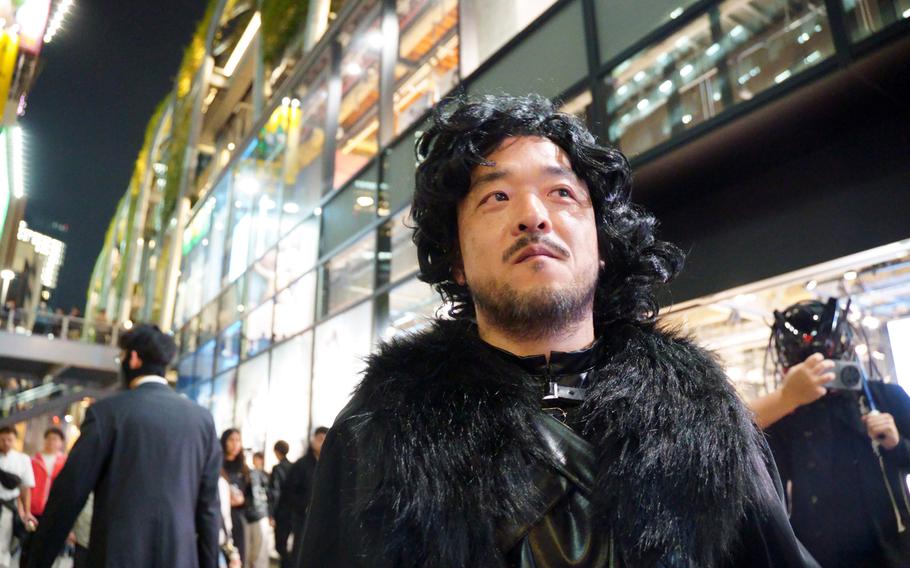 Tokyo resident Mike Tamura celebrates Halloween as Jon Snow from "Game of Thrones" in Shibuya, Tuesday, Oct. 31, 2023. 