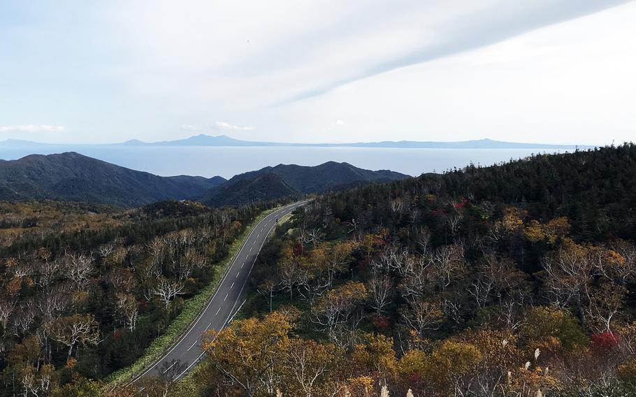 The southernmost of the Russia-controlled Kuril Islands is seen in the distance from the Shiretoko Peninsula in Hokkaido, Japan.