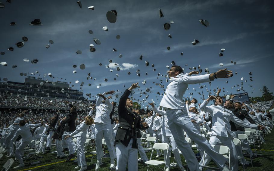 Newly commissioned U.S. Marine Corps 2nd Lt.s and U.S. Navy ensigns toss their covers at the conclusion of the U.S. Naval Academy’s Class of 2023 graduation ceremony, Navy-Marine Corps Stadium, Annapolis, Md., May 26, 2023. 