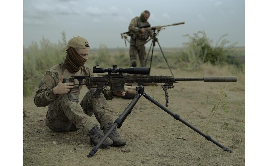 Alpha snipers practicing on a range near the Ukrainian eastern front on June 17, 2023. 