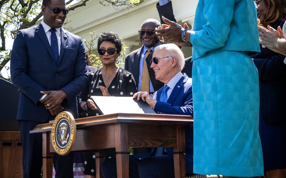 President Joe Biden signs an executive order to advance environmental justice at the White House. 