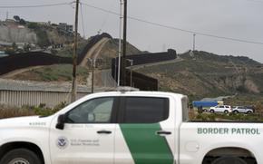 A Border Patrol vehicle sits near border walls separating Tijuana, Mexico, from the United States on June 4, 2024, in San Diego.