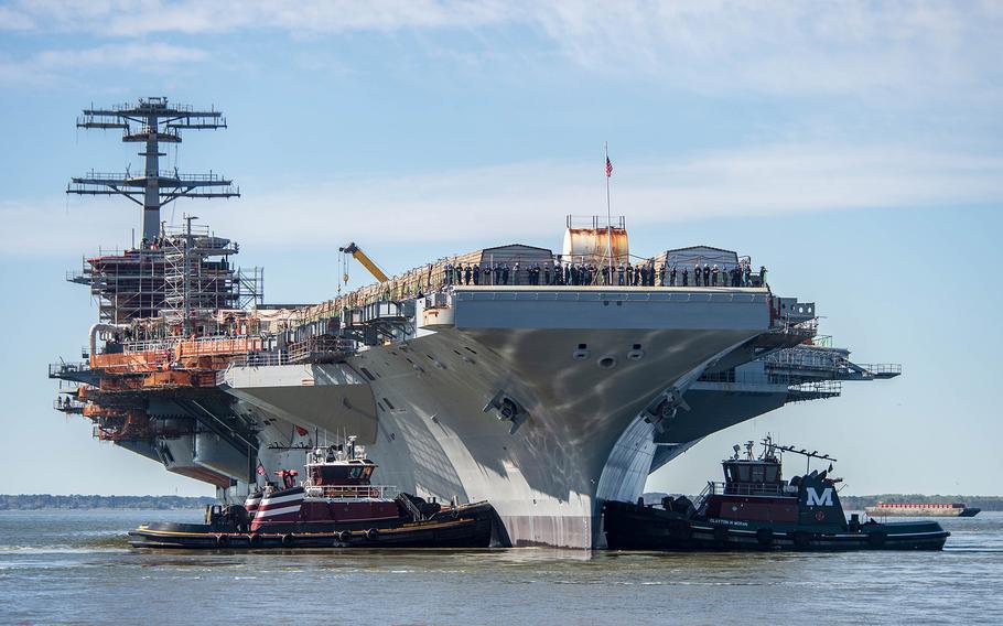 The Nimitz-class aircraft carrier USS John C. Stennis is moved to an outfitting berth in Newport News, Va., on April 8, 2024.