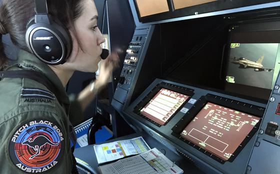 Australian air force Flight Lt. Jaqui Ozanne refuels a fighter jet aboard at KC-30A tanker over Australia’s Northern Territory, Thursday, Aug. 1, 2024.