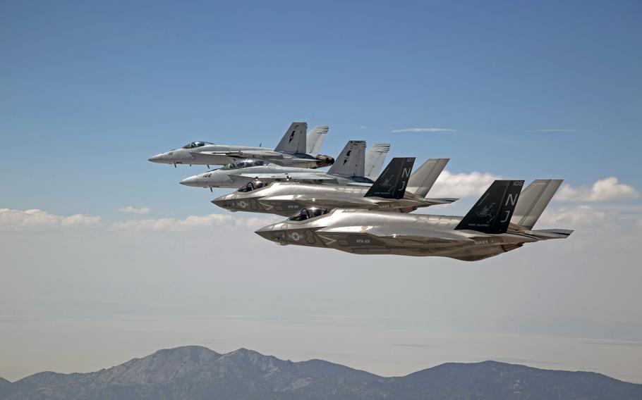 F-35C Lightning IIs and F/A-18E/F Super Hornets fly over Naval Air Station Fallon in Nevada. 