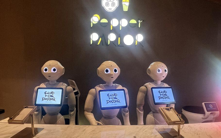 At Pepper Parlor, patrons may order from, converse with and be entertained by a robot fleet that outnumbers its human handlers overlooking bustling Tokyo. 