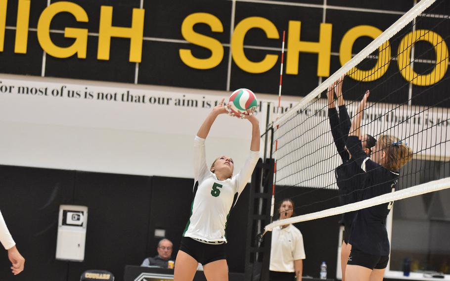 Naples' Emma Heavey tries a quick set over the net against Black Forest Academy on Friday, Sept. 13, 2024, in Vicenza, Italy.