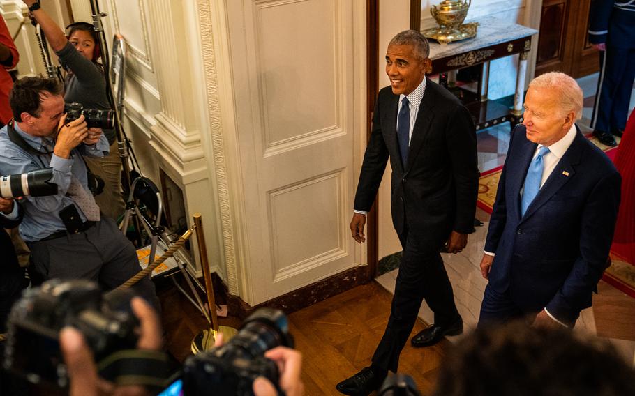 Barack Obama joins President Biden at the White House on Sept. 7, 2022, for the unveiling of the former president's portrait. 