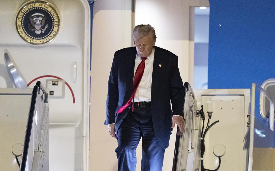 President Trump walks out of Air Force One.