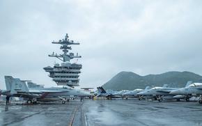 The aircraft carrier USS Theodore Roosevelt arrives in Busan, South Korea, June 22, 2024.