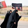 Baghdad, Iraq, Apr. 22, 2015: Two Shiite women walk along a highway during a pilgrimage from Baghdad to shrines in the city of Samarra, April 22, 2015. Later that day a suicide car bomb went off next to a crowd of pilgrims as they were returning from Samarra, killing eight and wounding 16. At this time, suicide bombings were a nearly daily occurance for millions of Iraqis.

Stars and Stripes reporter and photographer Josh Smith wrote about life amidst the ever present violence in Iraqi's capital in this 2015 article. 

https://www.stripes.com/theaters/middle_east/bombings-and-islamic-state-don-t-define-life-for-most-in-baghdad-1.344258

META TAGS: Operation Enduring Resolve; Iraq; Wars on Terror; suicide bombings; Iraqis; 