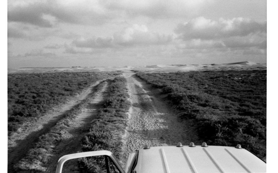 Sand dune in picture #23 but shown as taking the road. Picture #24.