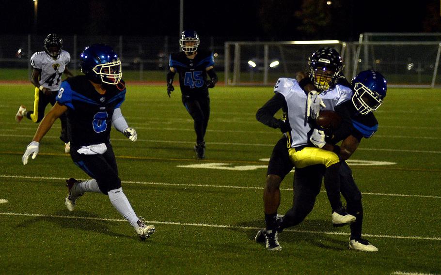  Leon Pierre-Louis ,makes a tackle.