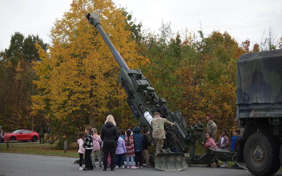 Students get a close-up look at a howitzer during STEM day at Grafenwoehr Elementary School.