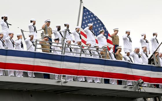 Sailors of the USS Richard M. McCool Jr. (LPD 29) salute and bring the ship to life along with Marines from Marine Aviation Training Support Groups 21 and 23 during the ship’s commissioning ceremony at Naval Air Station Pensacola in Pensacola, Florida Sept. 7, 2024. (DoD photo by EJ Hersom)