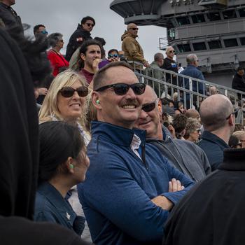 Guests aboard USS Carl Vinson for a Family and Friends Day Cruise watch an airpower demonstration on the flight deck on Saturday, Aug. 17, 2024.