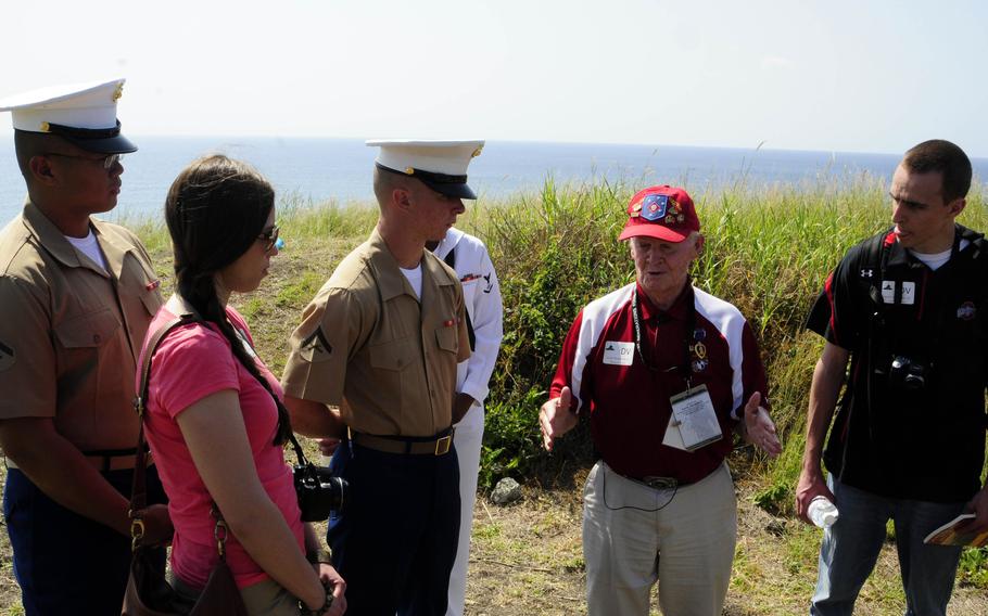 Jack Thurman speaks to military members.