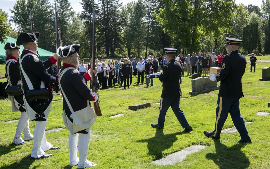 Oregon Army National Guard Funeral Honor Guard members carry the remains of U.S. Army Pvt. Billy E. Calkins at a memorial service