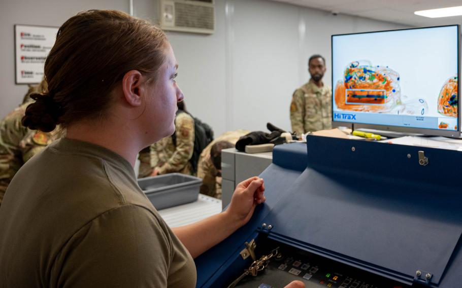 A 5th Logistics Readiness Squadron air transportation specialist observes an X-ray security scanner monitor at the Minot Air Force Base (AFB) passenger terminal in preparation for exercise Agile Warbird at Minot AFB North Dakota, June 13, 2024. 