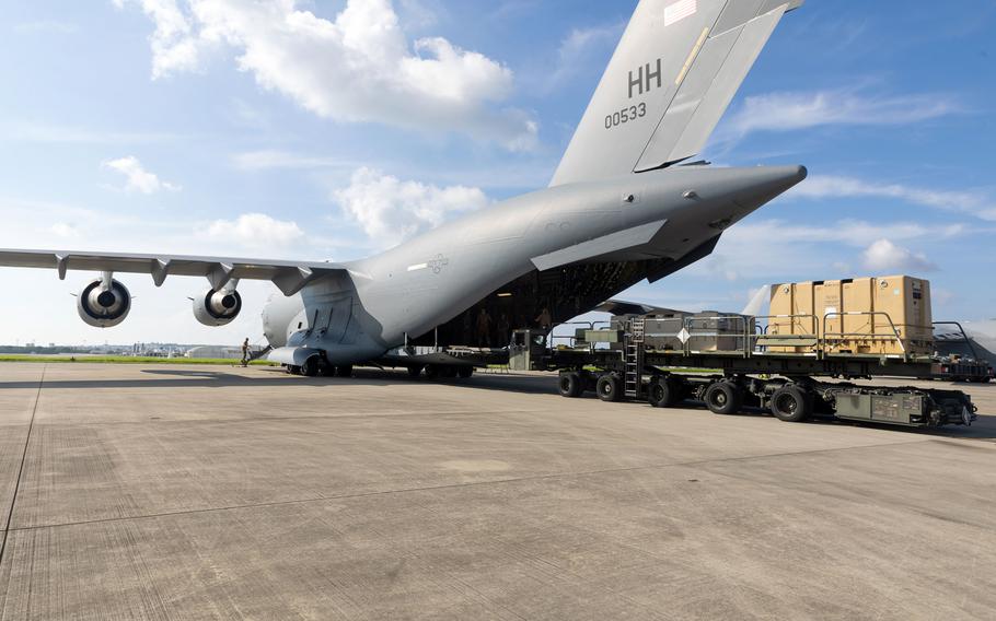 A C-17 Globemaster III assigned to the 733rd Air Mobility Squadron delivers MQ-9 Reaper systems at Kadena Air Base, Okinawa, Aug. 13, 2024.