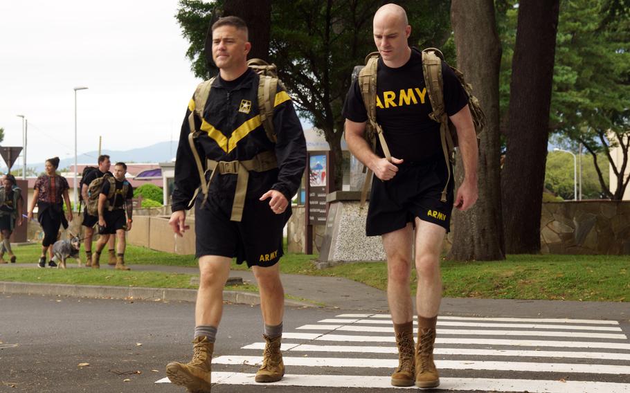 A ruck walk by about 25 soldiers, spouses and some energetic canines marked an opportunity to remember and reflect during Suicide Prevention and Awareness Month at Camp Zama, Japan, Thursday, Sept. 22, 2022.