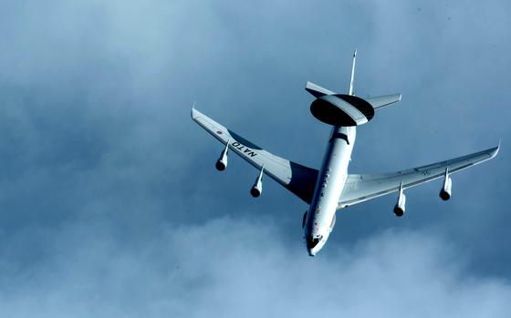 An E-3 AWACS airplane assigned to NATO Air Base Geilenkirchen, Germany, flies over Romania in 2022. NATO is stepping up its air surveillance along Romania’s border with Ukraine.